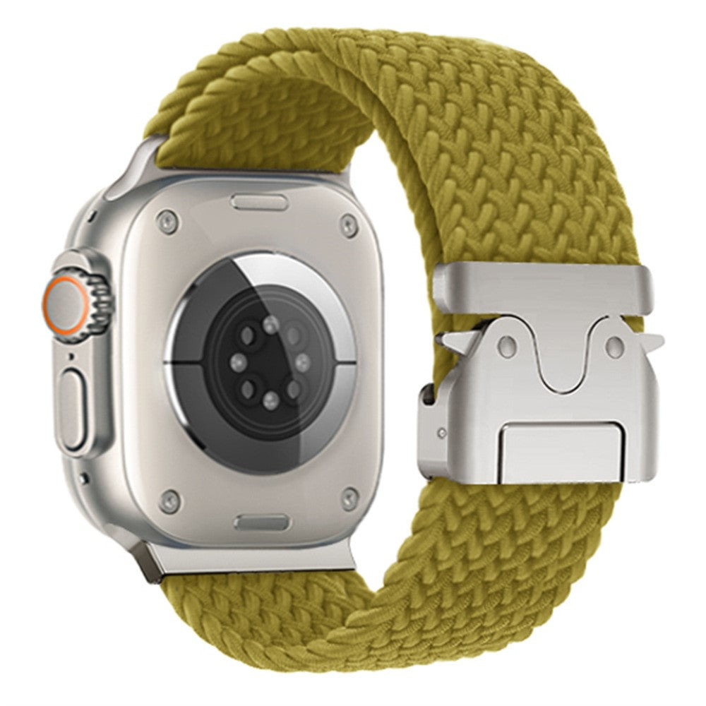 Flätat nylonarmband med fallskärms­spänne Apple Watch SE 40 mm, Apple Watch Series 1 38 mm, Apple Watch Series 10 42 mm, Apple Watch Series 11 42 mm, Apple Watch Series 2 38 mm, Apple Watch Series 3 38 mm, Apple Watch Series 4 40 mm, Apple Watch Series 5 40 mm, Apple Watch Series 6 40 mm, Apple Watch Series 7 41 mm, Apple Watch Series 8 41 mm, Apple Watch Series 9 41 mm Gulgrön