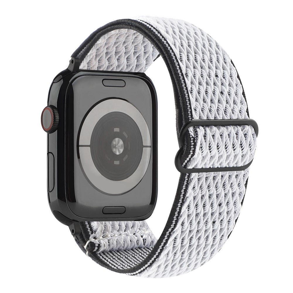 Vågmönstrat nylonarmband med justerbar rem Apple Watch SE 40 mm, Apple Watch Series 1 38 mm, Apple Watch Series 10 42 mm, Apple Watch Series 11 42 mm, Apple Watch Series 2 38 mm, Apple Watch Series 3 38 mm, Apple Watch Series 4 40 mm, Apple Watch Series 5 40 mm, Apple Watch Series 6 40 mm, Apple Watch Series 7 41 mm, Apple Watch Series 8 41 mm Svart / Vit