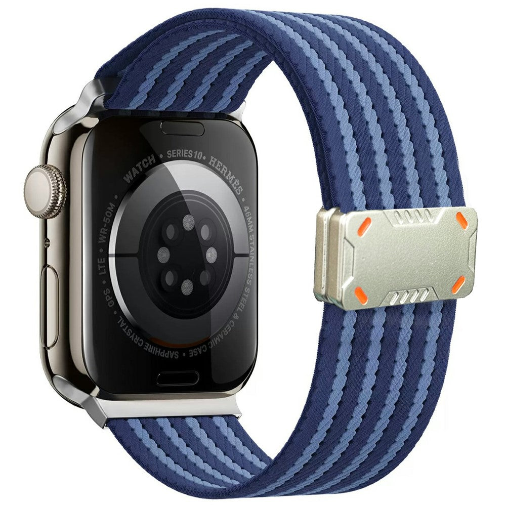 Nylonarmband med magnetiskt spänne Apple Watch SE 44 mm, Apple Watch Series 1 42 mm, Apple Watch Series 10 46 mm, Apple Watch Series 11 46 mm, Apple Watch Series 2 42 mm, Apple Watch Series 3 42 mm, Apple Watch Series 4 44 mm, Apple Watch Series 5 44 mm, Apple Watch Series 6 44 mm, Apple Watch Series 7 45 mm, Apple Watch Series 8 45 mm, Apple Watch Series 9 45 mm, Apple Watch Ultra 2 49 mm, Apple Watch Ultra 3 49 mm Blå