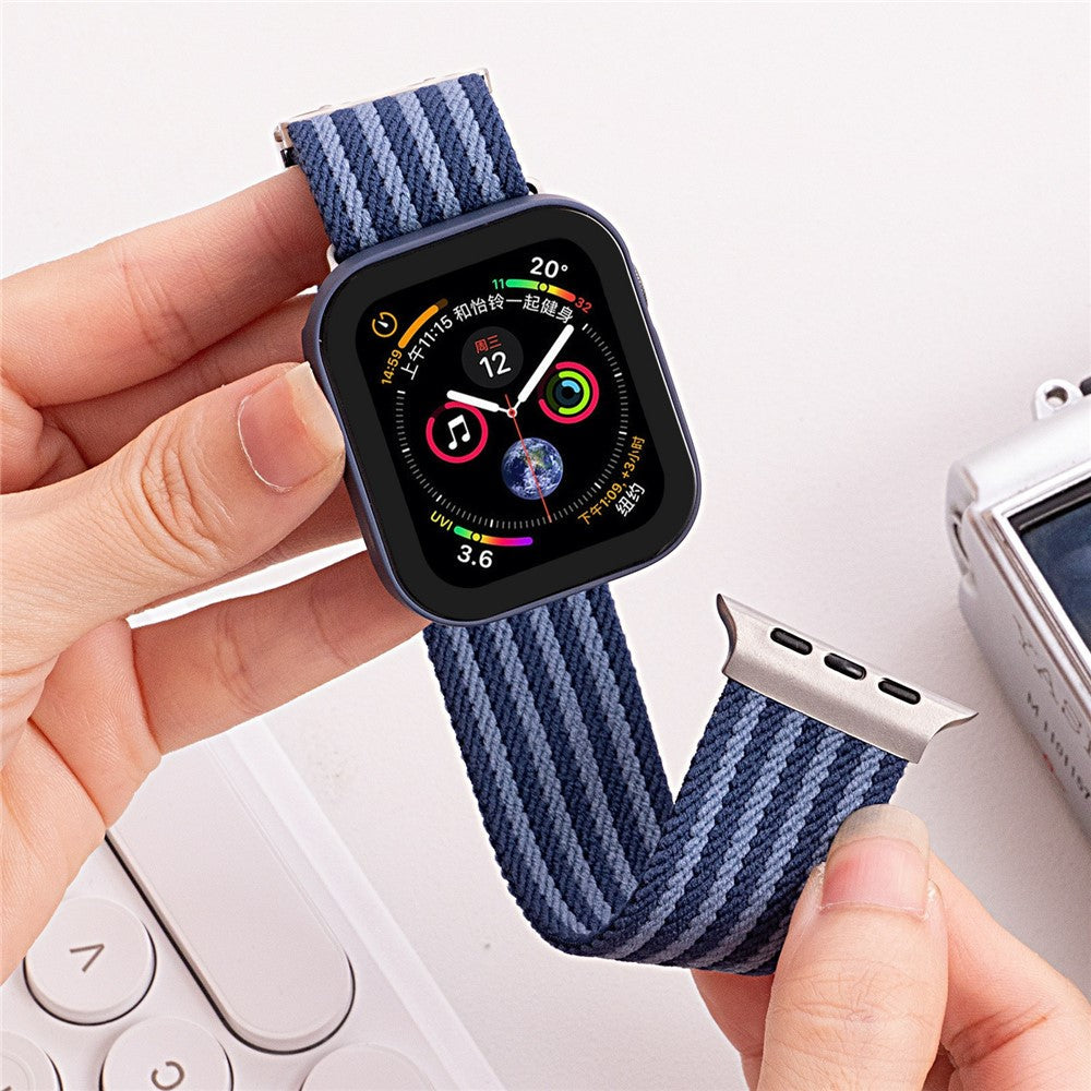 Nylonarmband med magnetiskt spänne Apple Watch SE 44 mm, Apple Watch Series 1 42 mm, Apple Watch Series 10 46 mm, Apple Watch Series 11 46 mm, Apple Watch Series 2 42 mm, Apple Watch Series 3 42 mm, Apple Watch Series 4 44 mm, Apple Watch Series 5 44 mm, Apple Watch Series 6 44 mm, Apple Watch Series 7 45 mm, Apple Watch Series 8 45 mm, Apple Watch Series 9 45 mm, Apple Watch Ultra 2 49 mm, Apple Watch Ultra 3 49 mm Grå