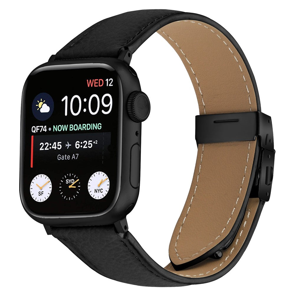 Läderarmband med svart fäste och klassisk spänne Apple Watch SE 44 mm, Apple Watch Series 1 42 mm, Apple Watch Series 10 46 mm, Apple Watch Series 11 46 mm, Apple Watch Series 2 42 mm, Apple Watch Series 3 42 mm, Apple Watch Series 4 44 mm, Apple Watch Series 5 44 mm, Apple Watch Series 6 44 mm, Apple Watch Series 7 45 mm, Apple Watch Series 8 45 mm, Apple Watch Series 9 45 mm, Apple Watch Ultra 2 49 mm, Apple Watch Ultra 3 49 mm Grå