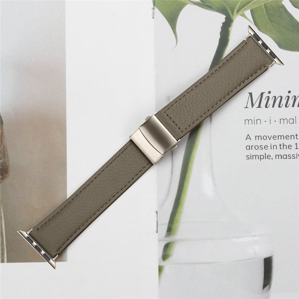 Äkta läderarmband med stjärnljusspänne Apple Watch SE 40 mm, Apple Watch Series 1 38 mm, Apple Watch Series 10 42 mm, Apple Watch Series 11 42 mm, Apple Watch Series 2 38 mm, Apple Watch Series 3 38 mm, Apple Watch Series 4 40 mm, Apple Watch Series 5 40 mm, Apple Watch Series 6 40 mm, Apple Watch Series 7 41 mm, Apple Watch Series 8 41 mm, Apple Watch Series 9 41 mm Grå