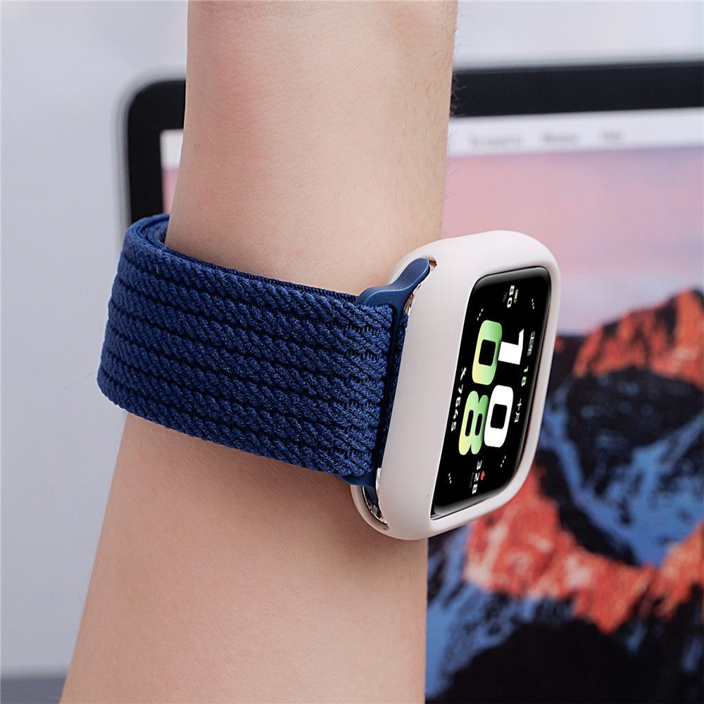 Magnetiskt nylonarmband med elastisk rem Apple Watch SE 40 mm, Apple Watch Series 1 38 mm, Apple Watch Series 10 42 mm, Apple Watch Series 11 42 mm, Apple Watch Series 2 38 mm, Apple Watch Series 3 38 mm, Apple Watch Series 4 40 mm, Apple Watch Series 5 40 mm, Apple Watch Series 6 40 mm, Apple Watch Series 7 41 mm, Apple Watch Series 8 41 mm, Apple Watch Series 9 41 mm Babyblå