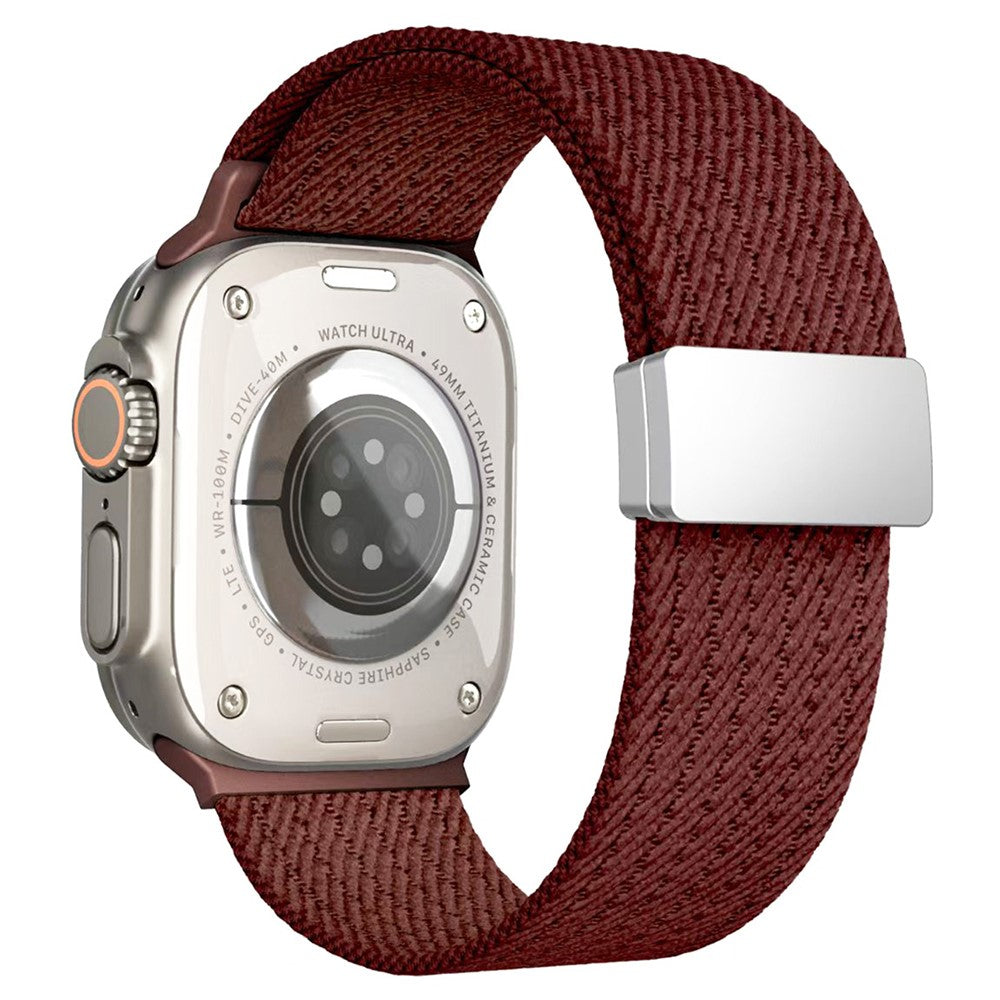 Magnetiskt nylonarmband med elastisk rem Apple Watch SE 40 mm, Apple Watch Series 1 38 mm, Apple Watch Series 10 42 mm, Apple Watch Series 11 42 mm, Apple Watch Series 2 38 mm, Apple Watch Series 3 38 mm, Apple Watch Series 4 40 mm, Apple Watch Series 5 40 mm, Apple Watch Series 6 40 mm, Apple Watch Series 7 41 mm, Apple Watch Series 8 41 mm, Apple Watch Series 9 41 mm Röd